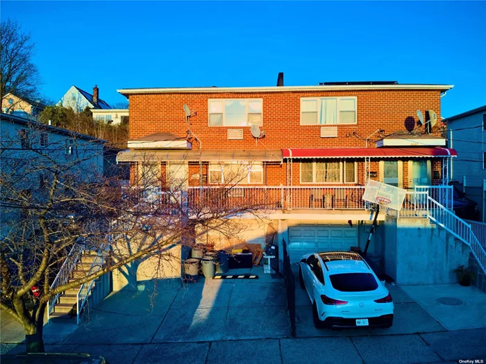SEMI-DETACHED FULL BRICK 2 FAMILY, BUILT IN 2000 ! 3 LEVELS ABOVE GROUND. 2X DRIVEWAYS FIT 5 CARS AND AN ATTACHED GARAGE. EACH FLOOR IS APX 1000 SQFT 3BED 2 FULL BATH (INCLUDING ENSUITE) OPEN LAYOUT, MANHATTAN SKYLINE SCENERY LOOK DIRECTLY FROM LIVINGROOM. FULL FINISHED TALL BSMT WITH OUTSIDE ENTRANCE. 2 SETS OF BOILERS AND FURNACES. CUL-DE-SAC . CLOSE TO ALL PUBLIC TRANSPORTATION/EASY ACCESS TO MAJOR HIGHWAYS.
