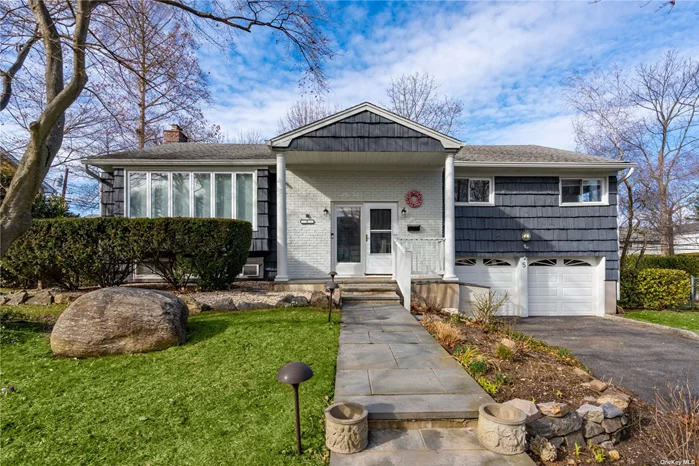 This beautifully updated ranch in the Forest Green Pool section of Oyster Bay features a completely open concept living, a recently renovated spacious kitchen with quartz countertops and stainless steel appliances, and an oversized countertop for entertaining. Other updates include central air, gas heat, and hardwood floors. The primary bedroom is complete with a newly renovated Bathroom. The lower level has a renovated space with new flooring and hi hats, where you can also enjoy the wood-burning fireplace. The house also includes a 2-car attached garage and is a part of the pool community of Forest Estates!! Prime location near schools, parks, LIRR. Must See! Check out the virtual tour for floor plan for additional photos!