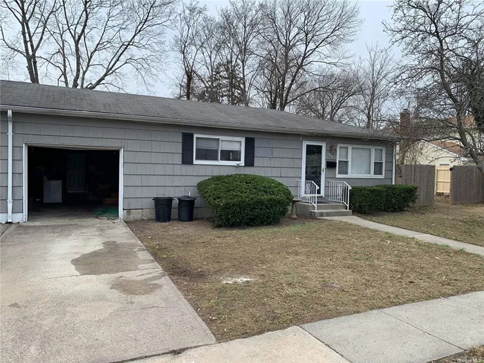 Beautiful 2 bedroom, 1 bathroom house in the heart of Patchogue. Includes a 1 car attached garage, fenced in backyard and washer/dryer. Pets are okay!