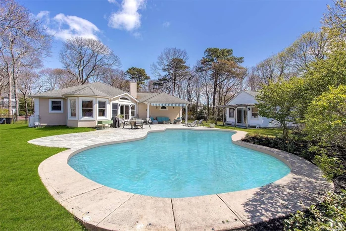 This perfect getaway in Hampton Bays epitomizes Summer in the Hamptons with its close proximity to all the gorgeous bay beaches, restaurants, and shops. It offers an open floorplan living area with fireplace, dining room, kitchen, en-suite primary bedroom and two guest bedrooms. For an added bonus, there is a beautiful pool house with full bath as well. The stunning in-ground heated pool is surrounded by a meticulously landscaped yard. situated on quiet cul-de-sac for peace and privacy. Enjoy Summer in the Hamptons as it&rsquo;s meant to be! Rental#RP220730