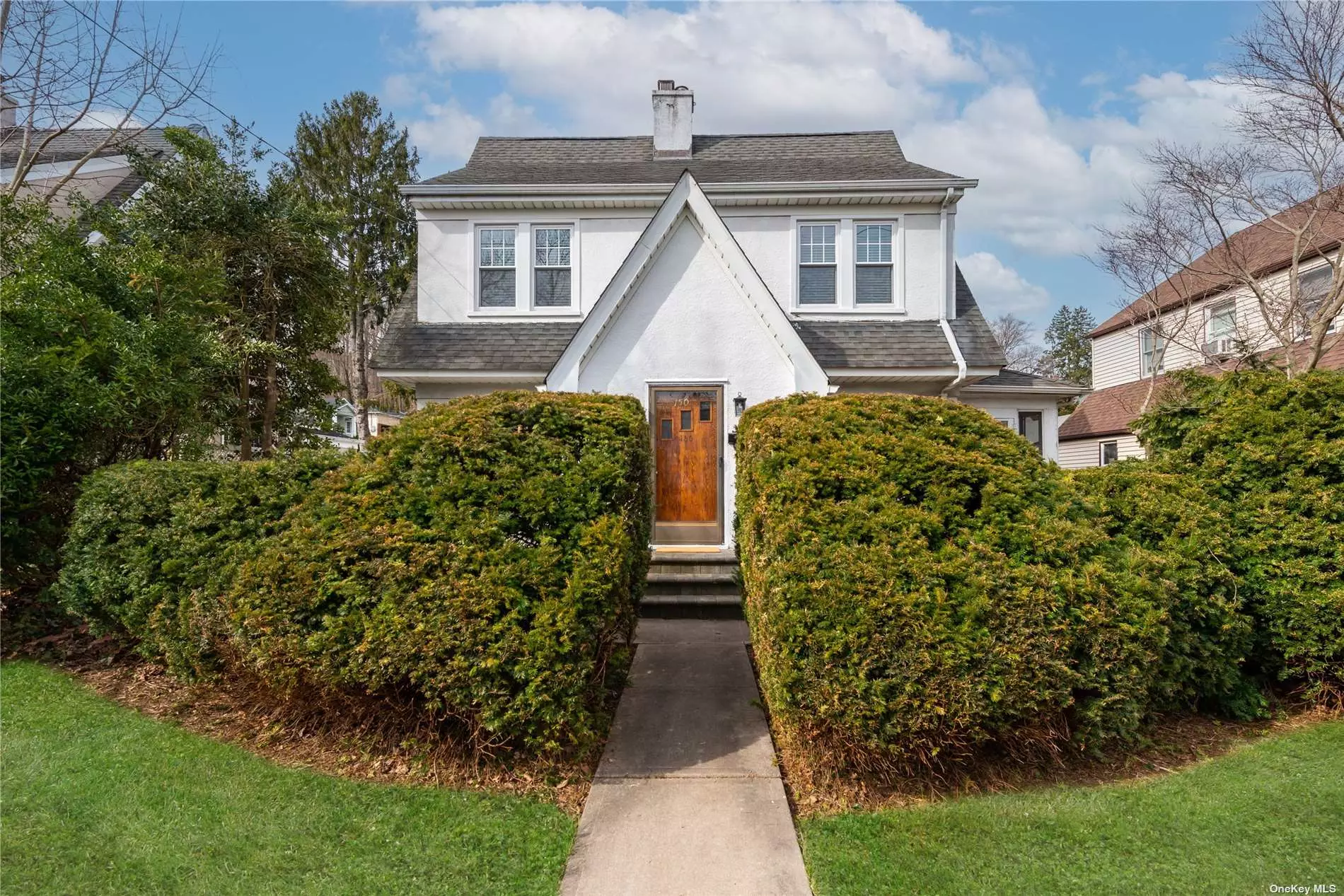 Fantastic location near park, beach, arboretum, restaurants, shops, library and all the historical sites of Oyster Bay .Close to LIRR and a 10 min drive to LIE. Completely renovated home in the hamlet of Oyster Bay. Beautiful new kitchen with pantry, granite countertops, and hi-end appliances, two new baths, welcoming entry foyer with glass door to a large and sunny living room with fireplace, formal dining room and enclosed porch. Three bright and spacious bedrooms plus a walk up attic for storage. Full basement with new washer/dryer and new flooring. Newly refinished gleaming hardwood floors throughout. New windows, new gas furnace and hot water heater. Private, fenced-in yard,  private driveway and two-car garage Tenant pays gas and electric.