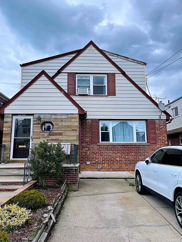 Large Two Family House in the heart of Bayside. One Block from Bell Blvd, Walk to LIRR. First floor 3B2B apartment, Second Floor 3B1B apartment. Must See!!