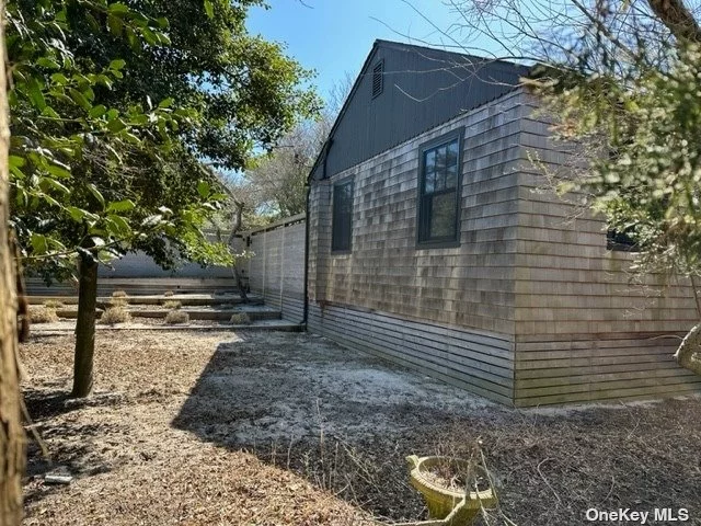 A unique opportunity to purchase a NEW fully renovated 1940&rsquo;s cottage with a large, oasis-like private yard. Perched mid-block on one of the highest points in Cherry Grove, every inch of this charming 2 bedroom, 1 bath home was reimagined and rebuilt in 2018. Fully legal, renovations include: modern kitchen w/high-end appliances, gorgeous marble bathroom, fully insulated, NEST controlled central heat and air-conditioning, new doors and windows, new septic system, new plumbing with On-Demand hot water. New electric, plus new fencing, decking and roof. Outside, enjoy a new heated salt-water pool, outdoor kitchen w/sink, storage & grill, large outdoor shower and multiple seating and dining areas designed for alfresco living. Poolside Storage Cabana has Miele washer and dryer, custom storage and 2nd refrigerator. Select furniture available for purchase/negotiation. MLS# 3467150