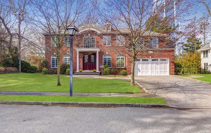 Magnificent Brick Colonial in the S Section of Roslyn Country Club. Wheatley Schools. Double Doors Entry Leads to Beautiful Sun Drenched Large Living room with hardwood floors. Large den/Tv Room, Eat in Kitchen with Sub Zero and Wolf appliances, Granite counters with island. 6 Br 4.5 Bths. Full unfinished but very clean basement. Must see! Shoes Must be off