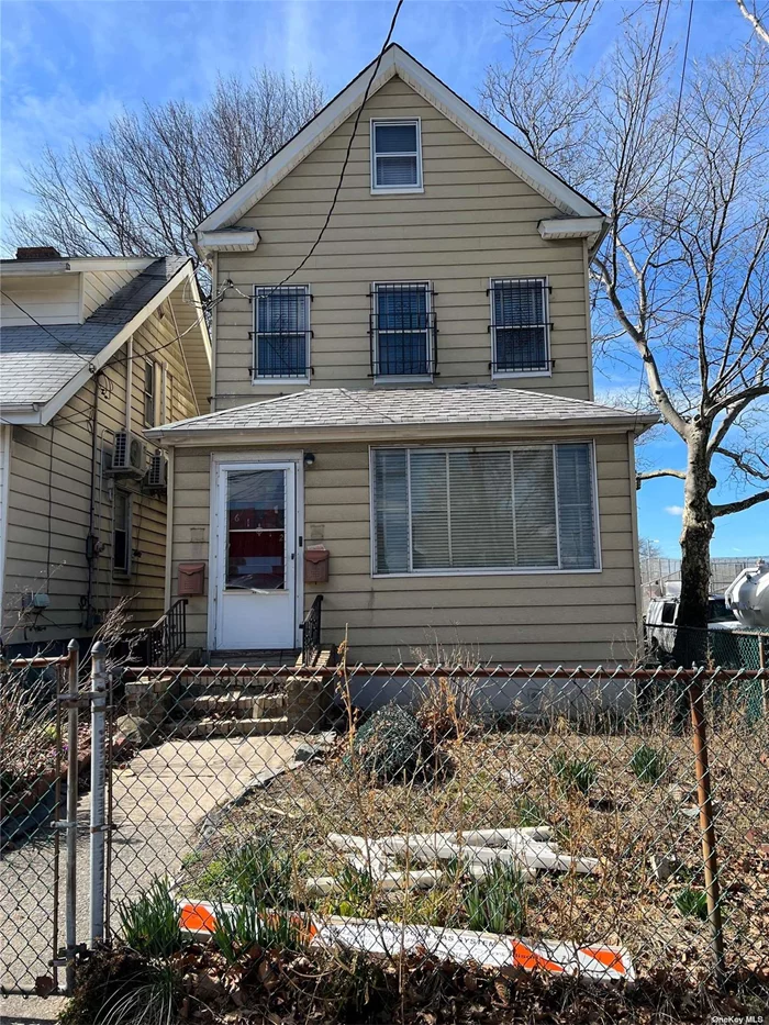 Calling all builders and investors, welcome to this diamond in the rough. Large two family home including full unfinished basement, walk up attic, & yard space. Conveniently located near Queens College, parkways, public transportation & parks. PROPERTY SOLD AS IS.