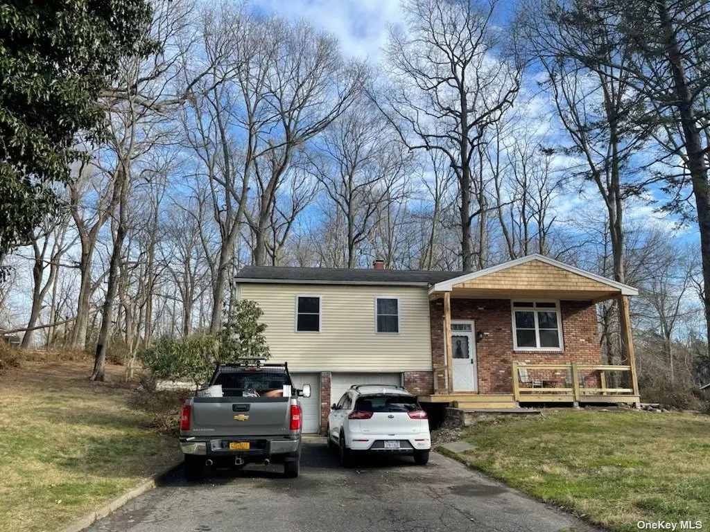 3 Bdrm, 1.5 Bath Hi Ranch W/Hdwd Floors Through Out, Corner Lot 1 Acre Horse Proerty, Large 2 Car Garage 24 x 26, CAC, Propane Heat, Propane Hot Water, Propane Oven, Many Upgrades! Thrmal Pane Windows, Renovated Bath, W/D Included, Custom 12x12 Shed. Downstairs Bonus Rm. Sliders Lead To Deck, SLiders Lead To Patio, Near To Stables. Move In Ready!