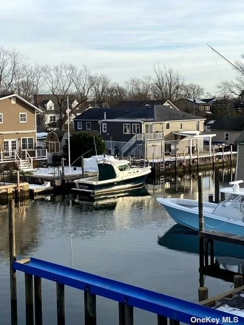 Beautiful Waterfront Three Bedroom, 1.5 Bath Apartment Located on the Second Floor Above an Office. Parking is on Site, Washer Dryer in Unit, Landlord Pays Heat & Hot Water, Balcony Off Master Bedroom Overlooking Canal, Hardwood Floors Throughout