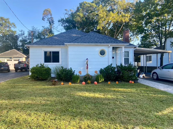 Adorable & Completely Updated Ranch in Islip. 2 Bedroom, 1.5 Bathroom, EIK, Dr/LR Combo. Full Unfinished Basement. Nice Size And Level Property with A Large Brick Patio. Cute As A Button!