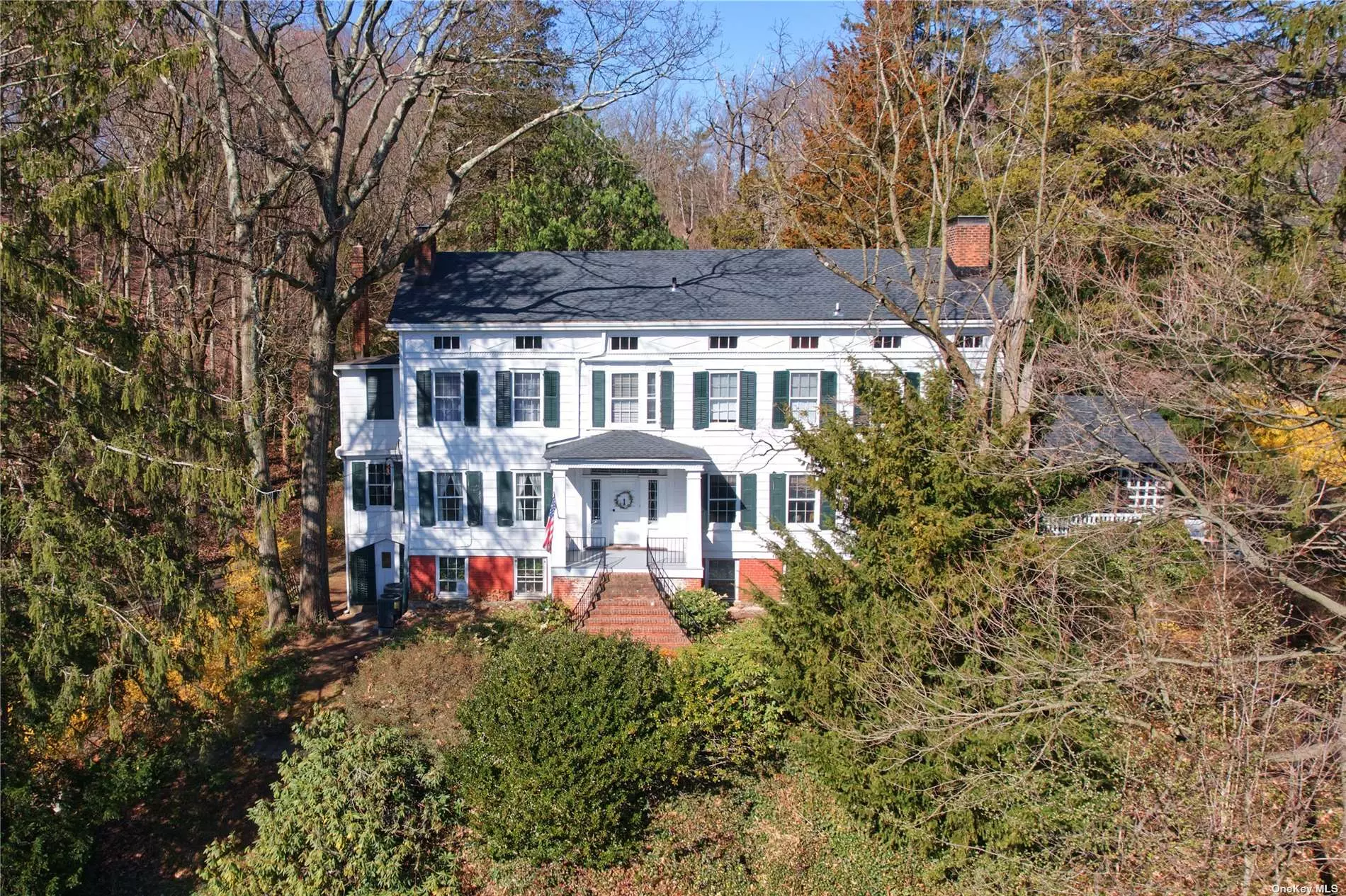 * OPEN HOUSE CANCELLED * Nestled in the heart of historic Roslyn Village sits a crown jewel atop a hill overlooking parks, ponds and Hempstead Harbor. Landmarked Locust Hill built in 1836 and expanded in 1926 by famed architect, Bradley Delehanty, bears all of the hallmarks of a well maintained and painstakingly restored home that pays honor to its roots. With a formal dining room, oversized living room, 8 bedrooms, 6.5 baths and over 4 acres to roam, Locust Hill is the perfect respite. Other notable features include 7 fireplaces, historic barn/garage, tennis court, gardens, wine cellar, original wood floors throughout, potting shed and a wonderful Adirondack room. This one of a kind property offers privacy amongst the trees and a bustling village just steps from the foot of the driveway, the best of both worlds. Locust Hill awaits it&rsquo;s next steward to continue breathing life onto its magnificent canvas.