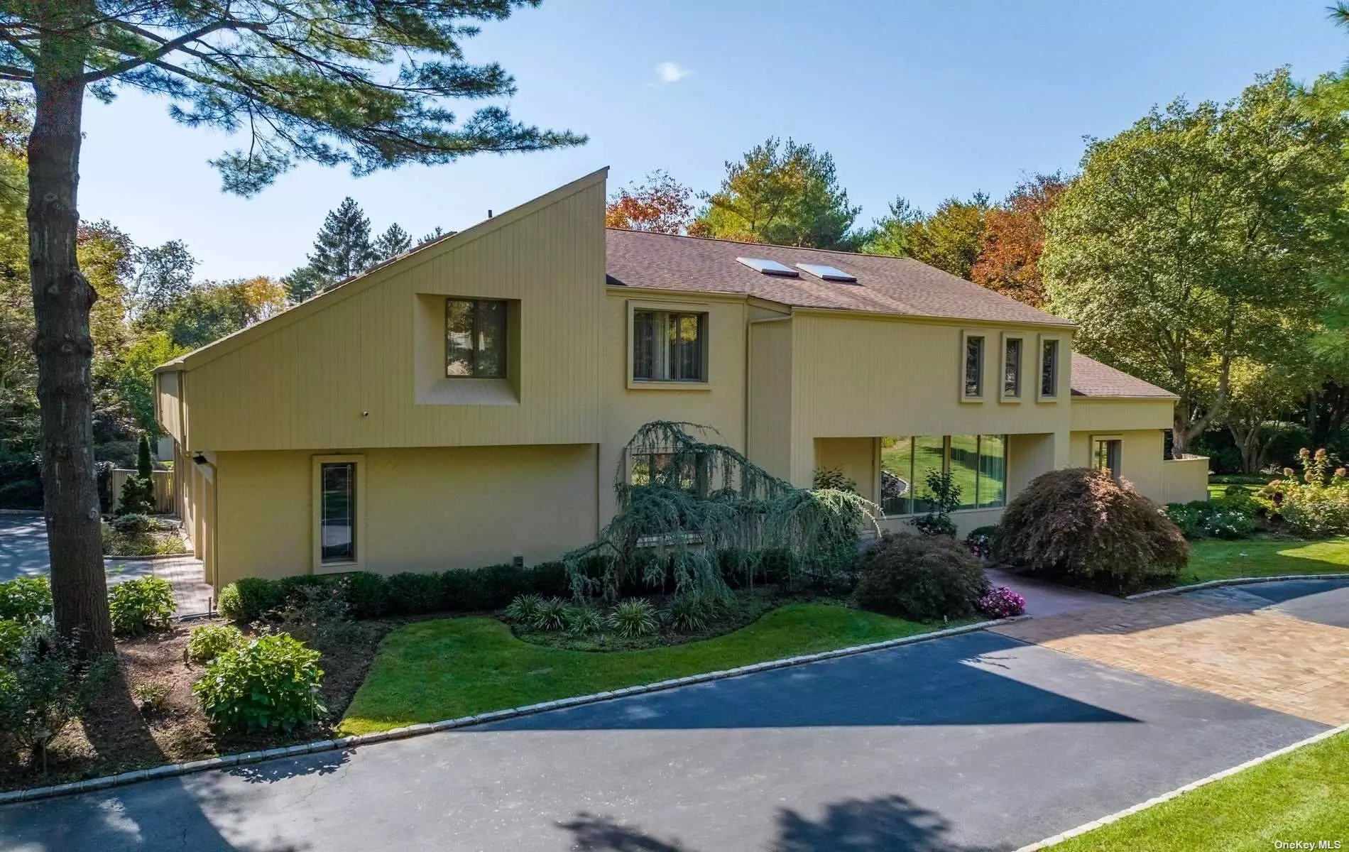 This meticulously maintained five bedroom home is located in the heart of Old Westbury on a quiet Cul-De-Sac. Highlights include hardwood floors, fireplace, new kitchen cabinets,  new storage cabinetry and new epoxy flooring in the three-car garage. Private bedroom suite and separate study on the main level. The two acre property is a Shangri la with a Koi pond fed by a waterfall, new cedar deck, newly resurfaced har tru tennis court and sparkling in-ground pool. Three car-garage, Generator. Ideal location with close proximity to the famed Americana Shopping, golf, the beach, horse trails and only 40 minutes to NYC and the airport. Jericho School District.