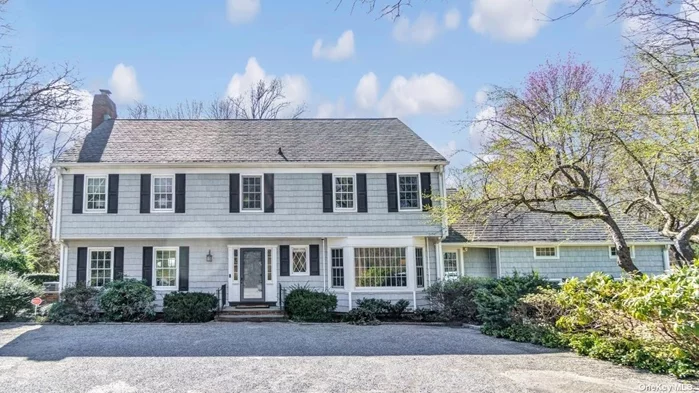 This magnificent Mill Neck colonial has been meticulously updated inside and out. The interior of this pristine home features 4 bedrooms - all with newly renovated en suite bathrooms - elegantly designed living/entertaining spaces, custom millwork, updated windows and doors, two gas fireplaces and a brand new whole house generator. Additional updates include new electrical wiring, recessed lighting throughout the house, central air conditioning, expanded plumbing lines and a newly dug well. There is ample storage as well as a two-car attached garage outfitted with a custom GarageTek storage system.  Situated on 3 park-like acres, the exterior of this beautiful, private property boasts mature plantings, a heated, in-ground gunite pool, two bluestone patios, a barn (equipped with multiple stalls, electric and water access) and a pool storage shed.  The home is conveniently located between the vibrant towns of Locust Valley and Oyster Bay with easy access to the Syosset and Locust Valley train stations. Taxes have been grieved.