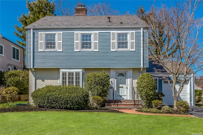 This beautiful Colonial is located within the Incorporated Village of Plandome Heights. Close to town, shopping, Long Island Railroad. This home features a center hallway leading to the eat-in-kitchen, 3 bedrooms on second level. 2.5 baths, gorgeous hardwood floors, a large living room with Bay Window & fireplace, formal dining room, Den, and office with bay window. The highlight of this charming classic home is an enormous 22x15 den with cathedral ceilings and 2 skylights, a second huge wood burning fireplace adorned with field stones from floor to ceiling. Arched 84 inch high windows flank the fireplace. Wall to wall glass sliding door opens onto a quiet patio. This amazing den with its beautiful wide plank oak floor is accessible from both the dining room & kitchen. You do not want to miss this house-it won&rsquo;t last!