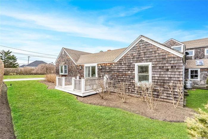 Perfect Beach Cottage on the bay in Quogue. There are four bedrooms, two baths and a screened in porch. The ocean is a distance across Dune Road or you can paddle board out your doorstep. Includes an outdoor shower and AC. Spend your summer days in beach perfection.