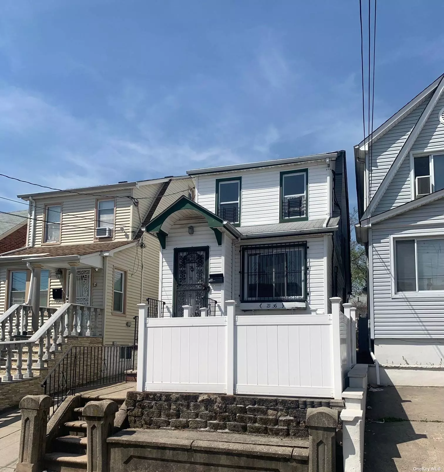 Nice And Clean Detached Colonial. 2 Bedrooms, 2 Baths, Living Room, Dining Room, Kitchen, And A Finished Basement. Shared Driveway And One Car Garage. All Conveniently Located Close MTA Buses.(Q25, Q34, Q20, Q65), Finished Attic And Also Zone R4A, Potential Two Dwelling House.