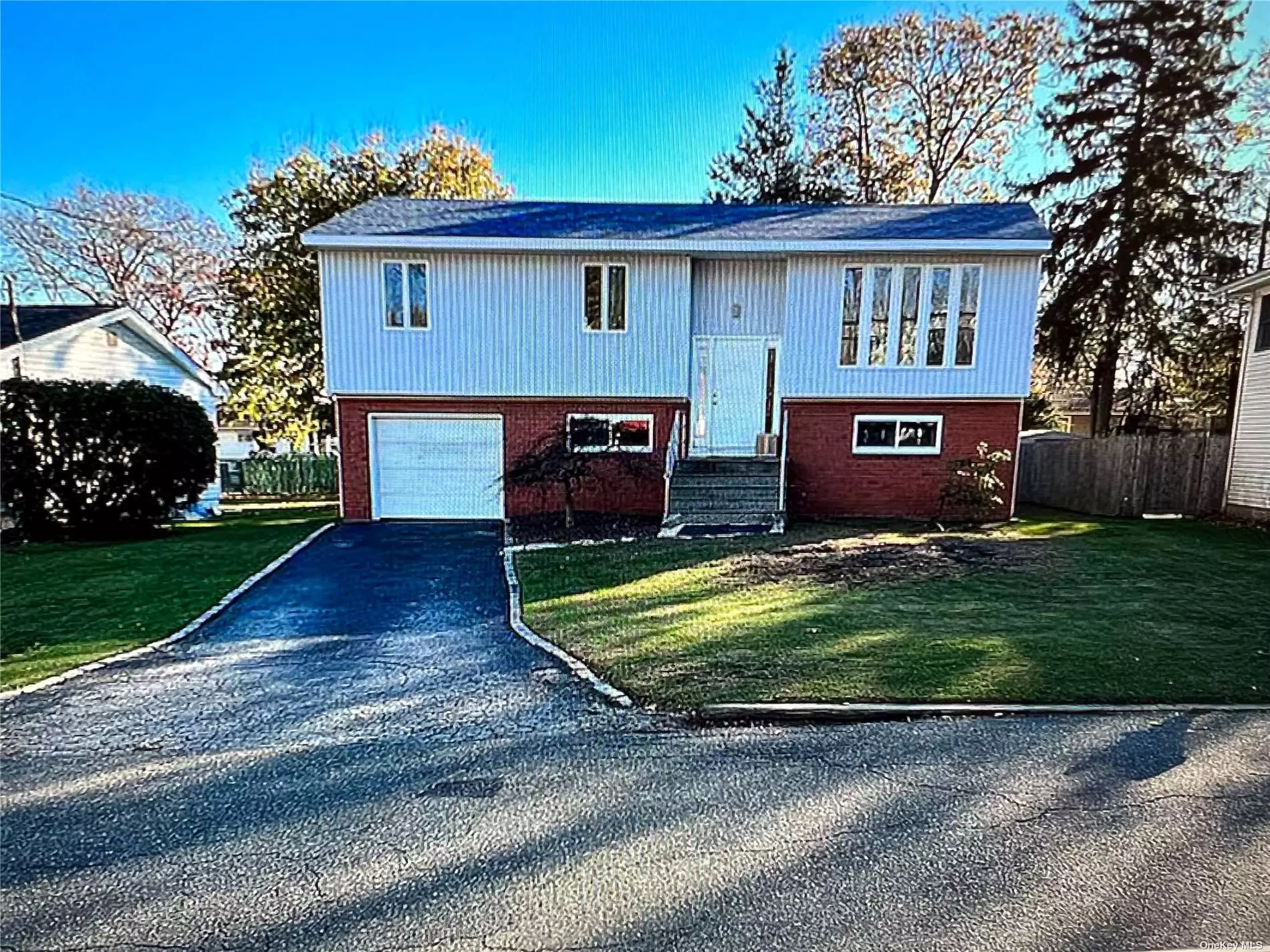 This 4-bedroom high ranch is located in the desirable Triangle section of Melville. Features include an eat-in kitchen with granite countertops, 2-zone heat, a new roof, and a one-car attached garage with inside entry. With some TLC on the outside, you can make this home your own. The mid-block location provides privacy and tranquility, and the low taxes are an added bonus. Don&rsquo;t miss this opportunity to own a beautiful home in Melville.