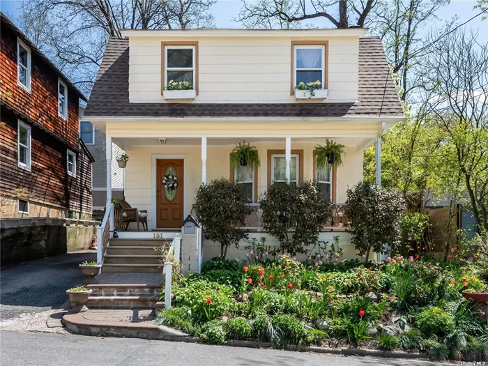 Great Starter! Charming 3 Br Dutch Colonial circa 1924 with Sweet Front Rocking Chair Porch, Entry Hall, Hardwood Floors, Vaulted Br Ceilings, Woodburning Stove in LR, Nice Sized FDR w/ French Doors to Beautiful Fenced In Maintenance-Free Garden. FDR Opens to Lovely Sunny & Spacious 10 yr old Kitchen w/ 2 Sinks & Lots of Storage. Many Updates like 10 year old Bath, 3 Yr Old Boiler, Newer Hot Water Heater, 5 Yr Old W/D, 7-8 Yr Old Roof, CAC Splits installed 8-10 Yrs Ago. Close to the Wonderful Village of Sea Cliff & Sea Cliff Beach. Enjoy ALL this Tight Knit Community has to Offer Such as Live Music, Yummy Restaurants, Unique Shops, the Sea Cliff Arts Council, Beautification Committee, and so Much More. You are Buying into a Lifestyle with Stunning Sunsets!