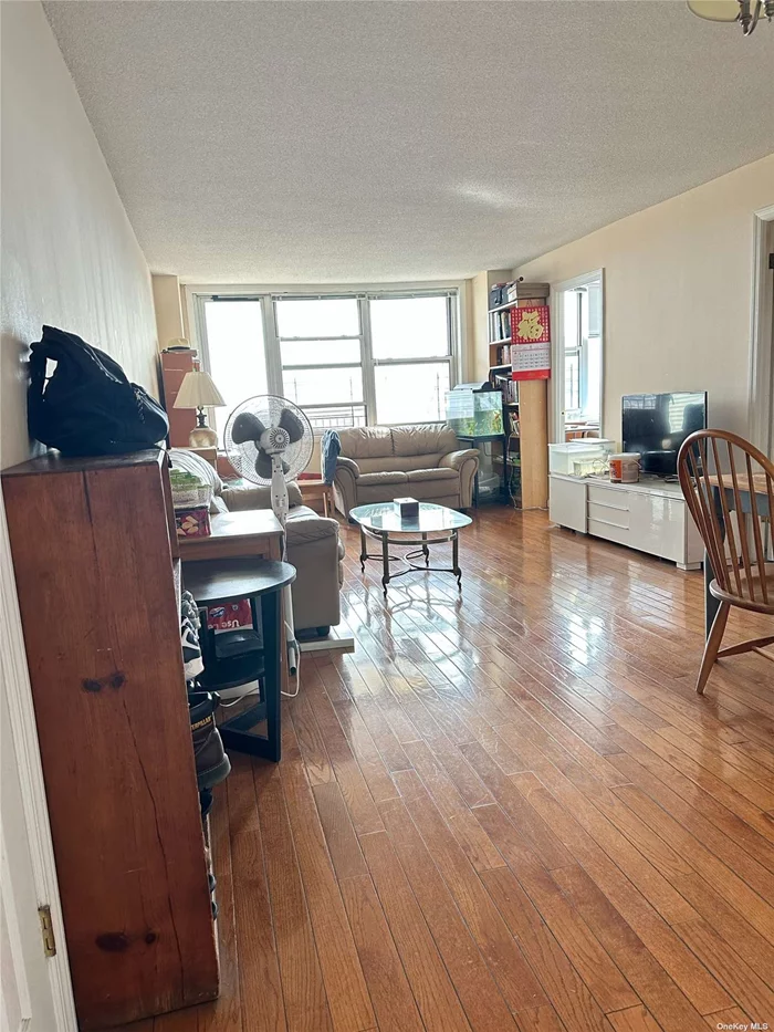 This high-rise corner aparment, facing southeast, has two bedroom 1.5 bath, located at central of flushing, close to all