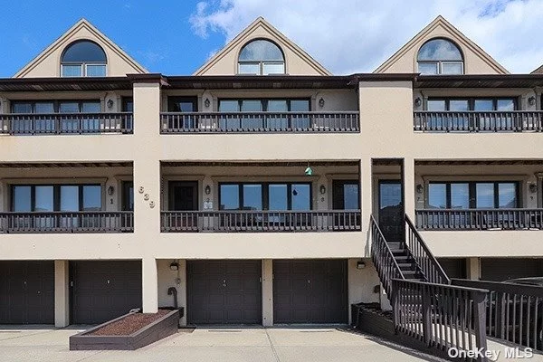 This turn key townhouse close to beach. Its concept living features, sun filled living room, dining room and eat-in kitchen, down the hallway to a full bathroom, bedroom or office, primary bedroom has a closet and ensuite. Freshly painted, gleaming hardwood floors, washer dryer, outdoor space and your own private 2 car garage plus driveway.