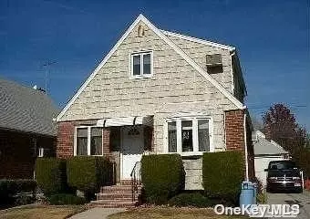 BRICK CAPE COD with 1/2 DORMERED 2ND FLOOR FEATURES 4 BEDROOMS 3 FULL BATH FULL FINISHED BASEMENT 1 CAR DETACHED GARAGE