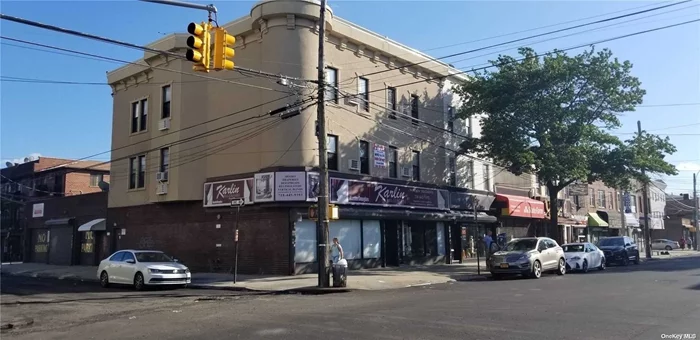 Mixed-Use Property In Excellent Condition; This Property Feaures1600 SQ/FT Space In The Rear Of The Building With A Full Basement With Rollup Gates, Two Sore Fronts, and Four Two-bedroom Apartments Two Of The Apartments Will Be Delivered Vacant, Conveniently Located Close To All.