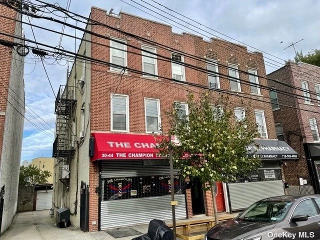 **Owner will hold 1st Mortgage with 30% down payment. Great Investment Opportunity: Legal 5-Family, plus Store. Semi-Detached Brick. Very-well maintained. Private backyard and 3-car garage. New roof. 1 block to Manhattan ferry service. Close to Bus, Socrates Sculpture Park, Costco and restaurants.