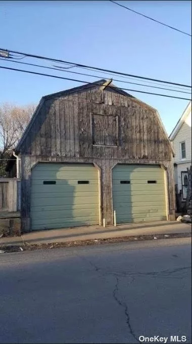 2 Dwelling House Excellent Condition. Double Home With Three Bedrooms And 1 Full Bath Each Side. With 2 Car Garages. Nice Corner Location Kitchen With Granite Counter Tops.