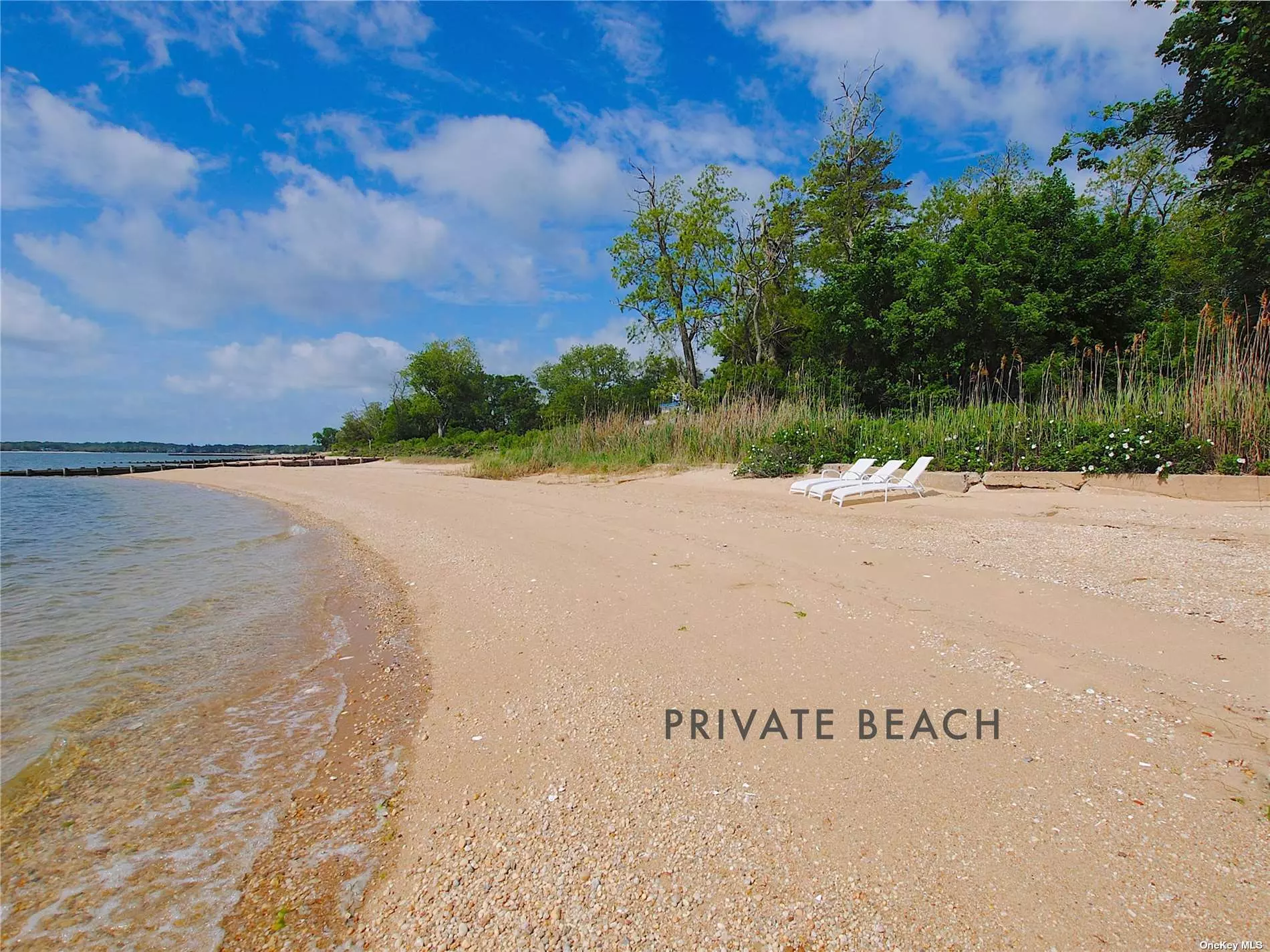 Quintessential waterfront North Fork farmhouse with private sandy beach on Southold Bay, part of the Peconic Estuary. Beautifully maintained, this large 4BR/ 2.55 BTH home benefits from many recent upgrades, including new chef&rsquo;s kitchen, renovated powder room, screened in front porch and back deck. Fabulous indoor/ outdoor North Fork Summer Living in the mature gardens with specimen trees, waterfront and vineyard views, and your private sugar sand beach to swim, kayak, paddle board, boat and fish. Close to all area attractions. Pet friendly! Walk to vineyards and organic farms for North Fork farm to table dining. Close to fine dining restaurants, farms, and waterfront bars. Fun arts, crafts, yoga, juice bar, live music and water sports, Southold, Greenport Maritime Village and ferries to Shelter Island, Sag Harbor and the South Fork easy to reach. Southold Town Rental Permit 0631