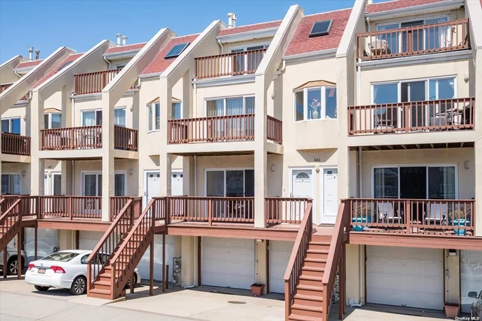 SUMMER Awaits, Steps away to Beach. Bright Fully furnished, 2-bedroom, 2-bathroom-End Unit Townhouse with driveway parking. Washer/Dyer and Central Air. Affordable Summer Rental with outdoor balcony.