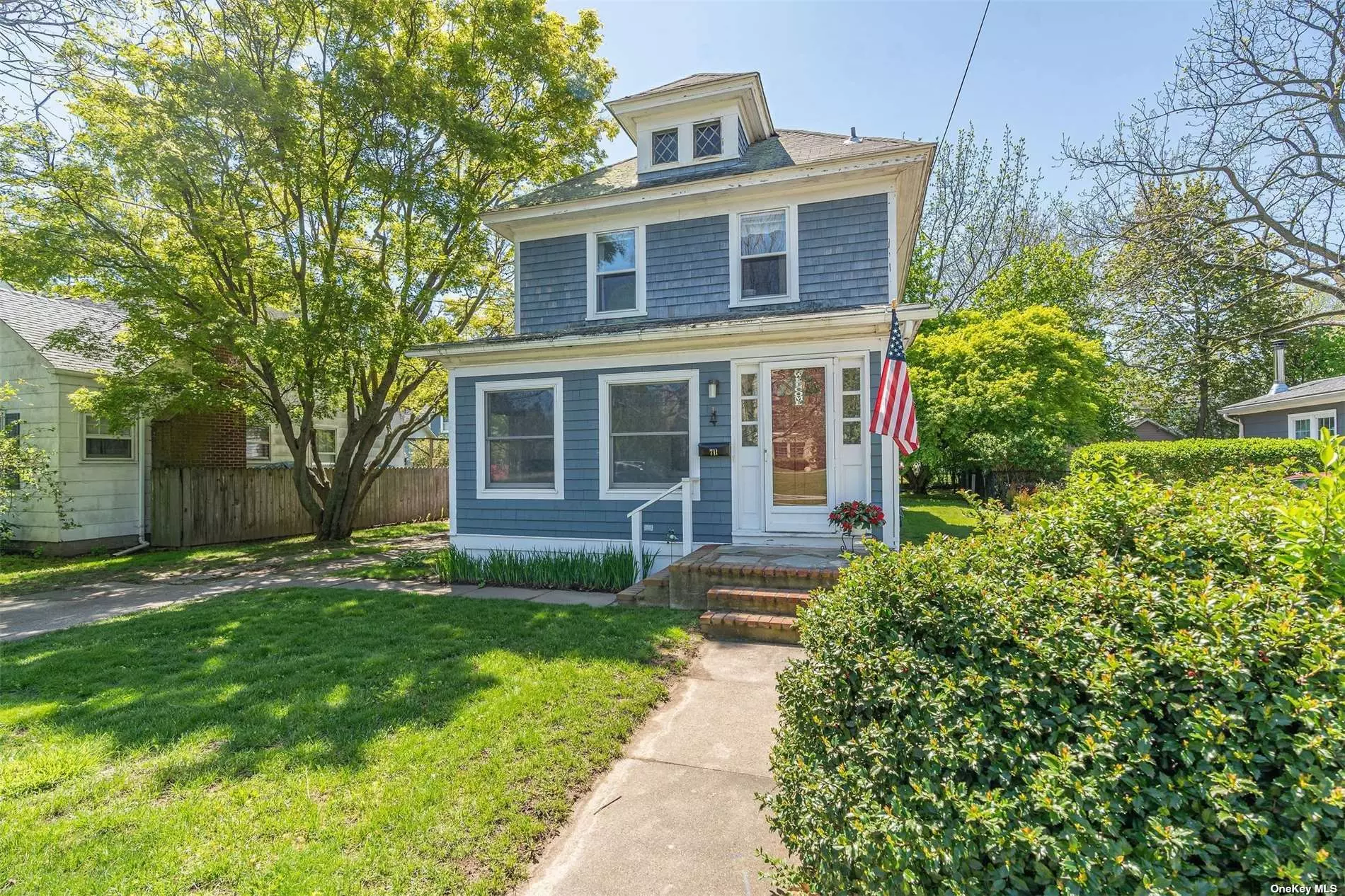 Location, location, location! Great opportunity to be right in the heart of Greenport and all the village has to offer! Right around the corner from amazing sandy bay beach!! This charming early 20th century home offers 3 bedrooms, 1.5 baths, lovely enclosed front porch, and hardwood floors throughout the entire home (under carpet). The half bath could easily be transformed to a full bath. This home has been well cared for and loved and with some vision, it has the potential to be updated and transformed into the ultimate weekend getaway place or year-round home!