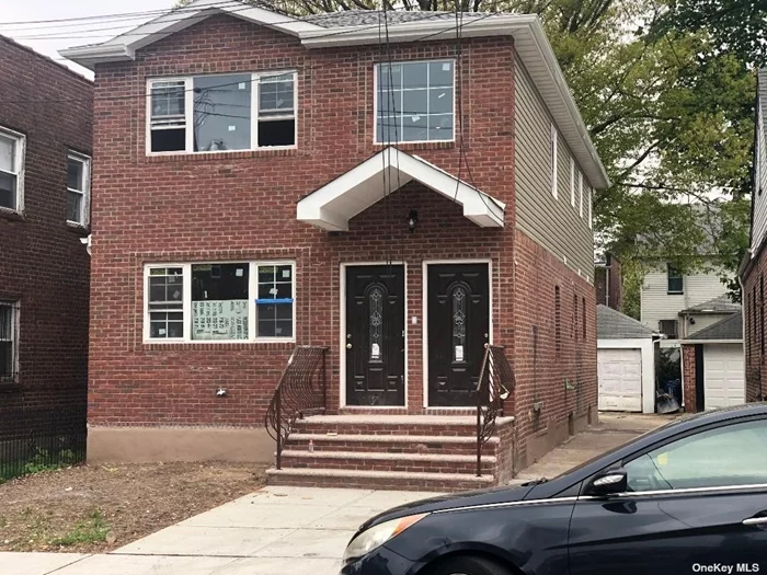 A beautiful updated 2 family home offering 3 BR, 2 Bath on each floor, with full finished basement and Bath. Stainless steel appliances, nice kitchens, wood flooring throughout the house. Driveway and garage, 2 boilers and hot water heaters. Near to transportation.