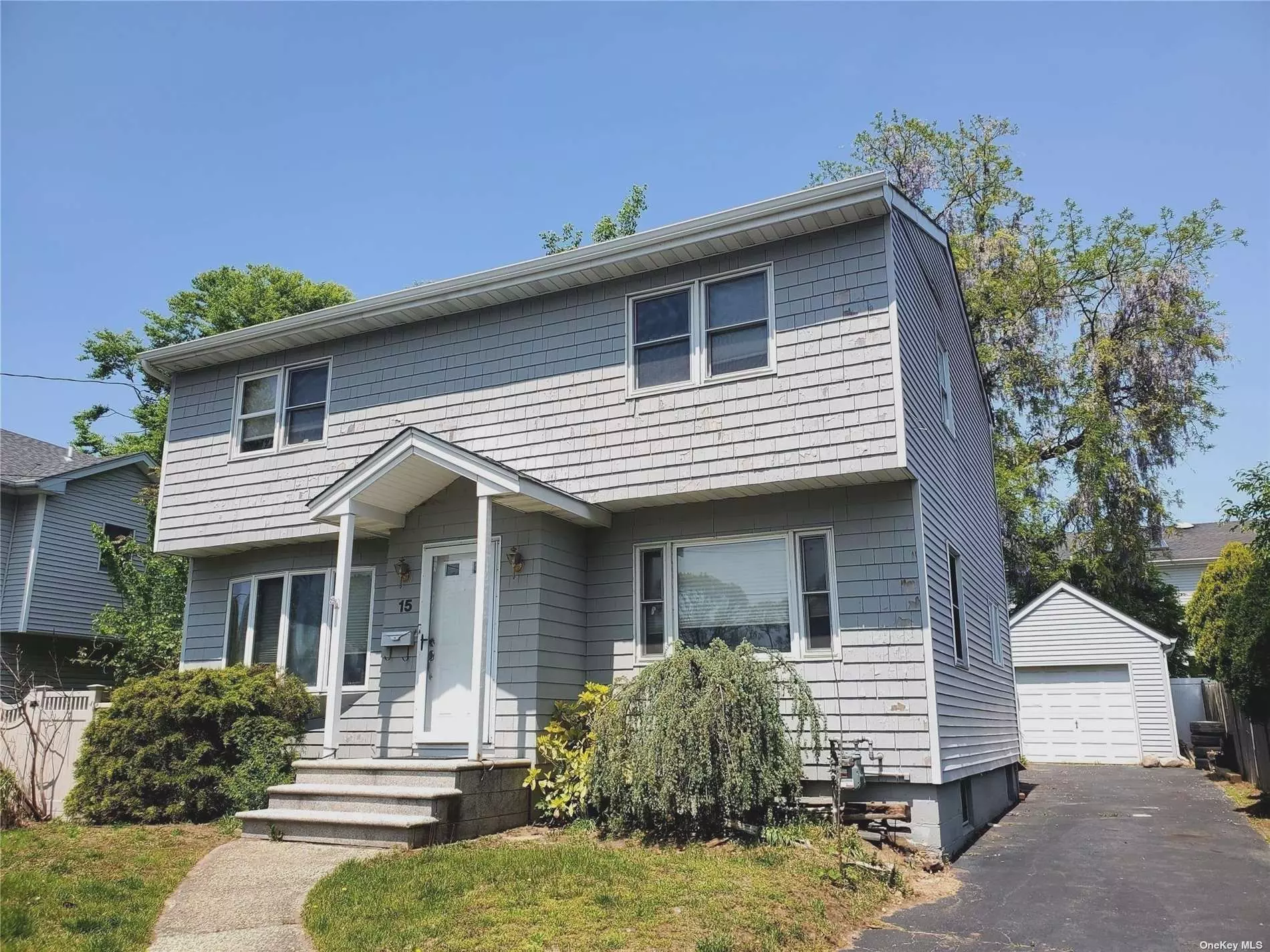 What an opportunity! 3 bedrooms with high ceilings. 2 full Baths, Master has walk-in-closet., Full basement with washer & dryer.  New Hot Water Heater and New Gas Burner. Sliders in living room leadto large deck, leading to yard and Detached 1 car garage. NONE FLOOD ZONE.  So many possibilities!!