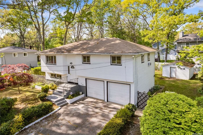 Newly renovated 4bedroom 2 bathroom High ranch featuring hardwood floors all new stainless steel appliances lots of cabinetry space 2 car attached garage and ample space in every room.