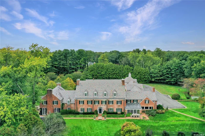 Just Reduced, Ready to Sell! Introducing GRAY HORSE FARM: This magnificent iconic estate on desirable Piping Rock Road is situated on 9 flat acres and offers 13, 324 square feet of luxe living plus beautiful apartments, exquisite pool and pool house, stable, paddocks, barn, tennis and sports court. The impressive scale of the home is enhanced by vintage millwork, antique hand-painted wallpaper, and priceless Samuel Yellin front gates from the JP Morgan estate. Built in 1924 and designed by architect James W. O&rsquo;Connor and landscape architect Robert Ludlow Fowler, this classic brick Georgian Colonial resonates with old-world charm and grace. Original architectural details combine beautifully with a modern lifestyle for exceptional entertaining. With amazing property and amenities, make this home your own spectacular residence! Part of Locust Valley School District, convenient to private schools, fine dining, Americana shopping, 27 miles to Manhattan. Equestrian&rsquo;s delight! keep your favorite horses near you!