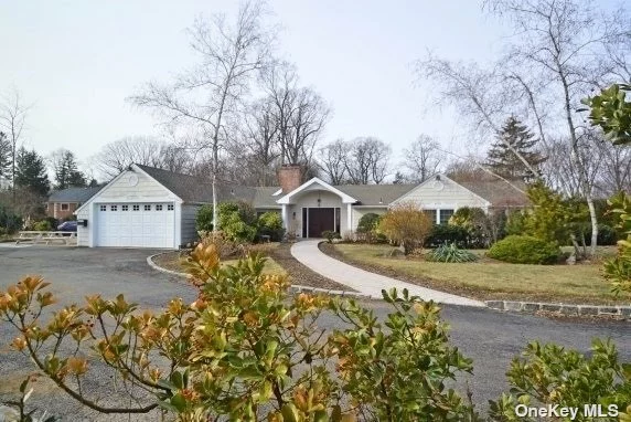 Nestled in one of the most desirable block in the Village of Kings Point, 215 Dock Lane is a renovated home, offering a large Living Rm with fireplace, Formal Dining Rm, large Sun Room, Den, Magnificent Eat-in-Kitchen W/French Doors Leading To large patio overlooking a lush manicured property. Large master suite with walk-In closets & spa bath. Lower level With door to backyard featuring Bedroom/office, full Bathroom, Large recreation room with fireplace and lots of storage.