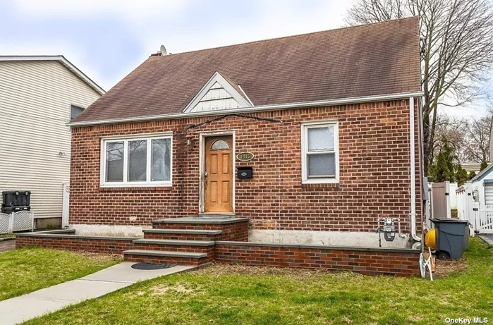 3 bed 1 bath cape with a finished basement and spacious yard centrally located with low taxes
