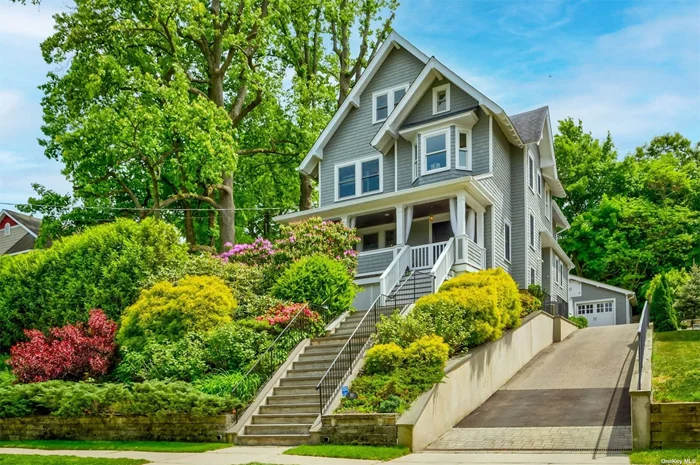 Meticulously expanded Victorian completely rebuilt to accommodate today&rsquo;s lifestyle, while preserving what makes a house of this kind so special. Sited on an exquisite professionally landscaped double lot, yet right in the middle of town & close to all, this is a rare find. Every inch showcases the incredible attention to detail, from the leaded glass on the entry door, the gorgeous moldings & reclaimed fixtures, to the custom tile work & cabinetry...you can see the care in the design choices. The house has every room you need & all with modern appointments: a chef quality kitchen with high-end appliances, a large den with gas fireplace that leads to yard, mudroom & powder. Formal dining room, formal living room with wood-burning fireplace & a truly wonderful front porch perched perfectly for outdoor enjoyment. Primary bedroom with gas fireplace & full spa bath, 3 additional bedrooms, laundry & full hall bath. A walk-up attic with year round water views. Lower level recreation, full gym with sauna & full bath. CAC, upgraded plumbing, electric & heating, 2 car detached garage...Beach and mooring rights, with applicable fees. A modern classic.