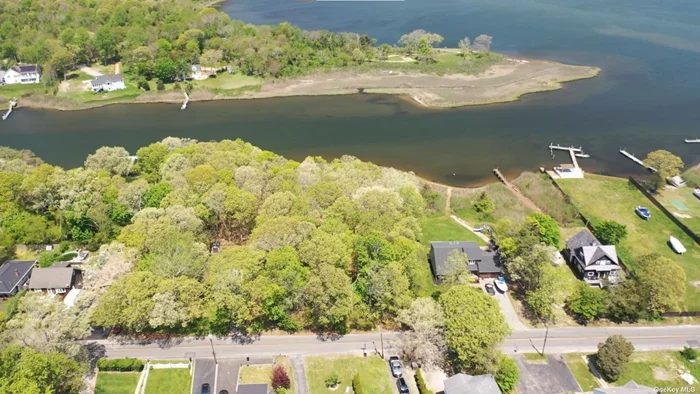 This is the plot you have been waiting to build on. Located seconds from Moriches Bay and having 106&rsquo; of water frontage this plot is a boaters dream. Property is a part of phase 3 of the new sewer district. Plans are available, the plot is single and separate and located adjacent by water to the Old Mastic Historic District. The lot is fairly flat and wooded.