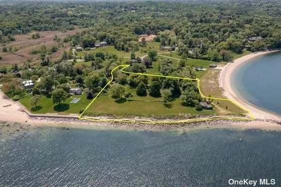 Welcome to Peacock Point ! Once in a lifetime something this magnificent comes to the market. One of the Gold Coasts historic locations overlooking the Long Island Sound has a pedigree dating back to the 1860s when it was farmland for the Peacock Family. This 4.13 direct waterfront lot has approximately 809 feet of frontage on two sides. Some of the original details of the 1915 Walker & Gillette designed Georgian Revival home remain. They include garden brick walls, reclining lion sculptures, stairs and the original waterfront casino pavilion with pergola, balustraded terrace and bathhouse. The stunning original landscape design was commissioned by the Olmstead Brothers and offered broad expanse of lawn to maximize the views. Magnificent and stately trees compliment this vista. This private Association with yearly dues includes the private road and access to a waterfront tea/pool house cabana and pool, private beach and mooring rights. This pristine and magnificent property offers open views of Connecticut and sweeping vistas of water. Imagine the sunsets from this stunning location Also for sale is an additional 4.84 acre parcel next to this property which would make in total a 8.97 waterfront Estate lot. Yearly HOA Dues $6000 per Tax Lot