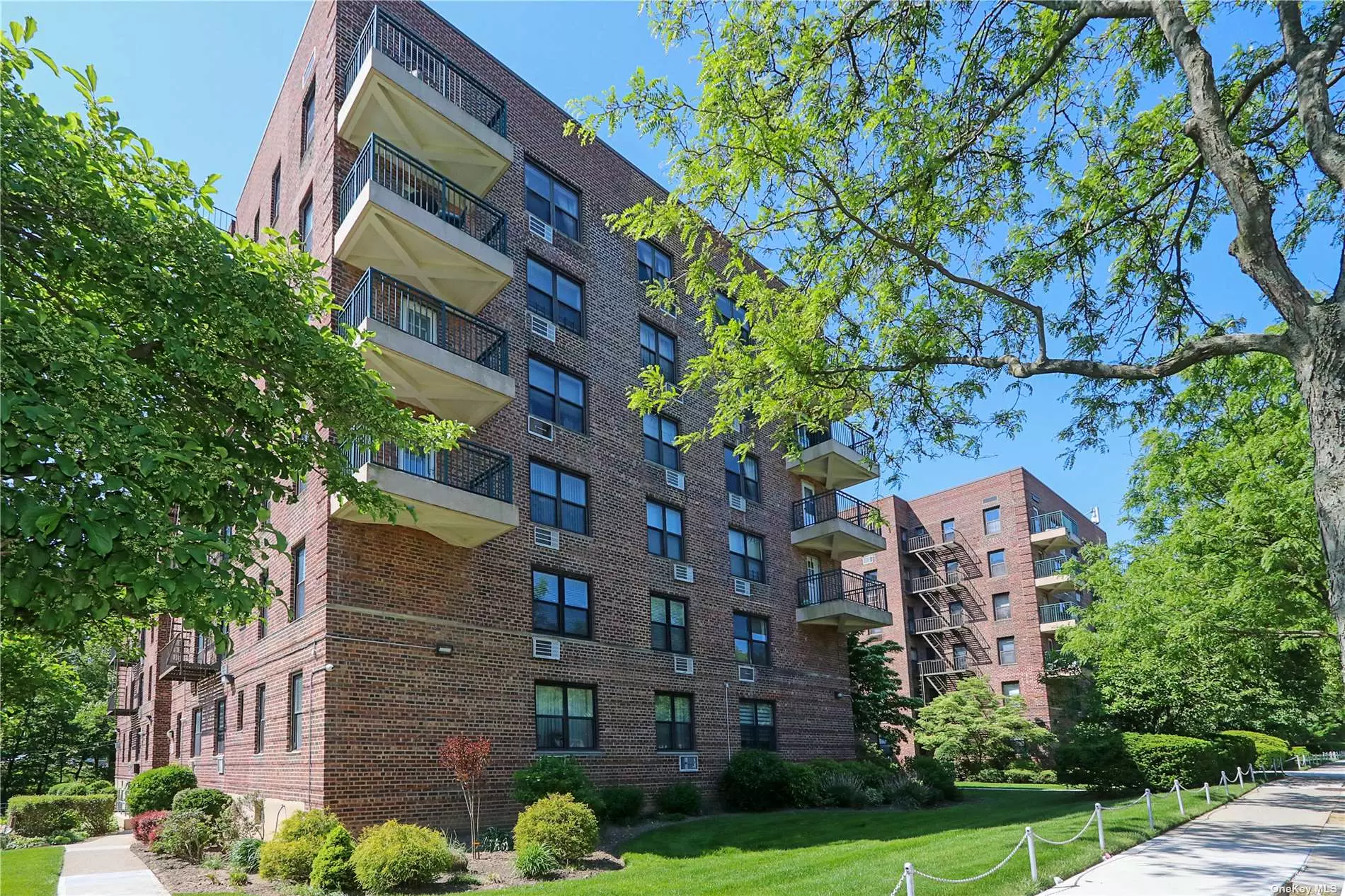 Welcome to this completely renovated and spacious 2-bedroom, 2-bathroom co-op, desirable top-floor unit, lots of natural light and a private balcony, located in the Oakland Gardens section of Bayside. This home was gutted and renovated in 2018. Renovations and materials, including but not limited to, new sub floors, new hardwood floors, recessed lighting, lighting on the balcony, custom cabinets and closets, European materials including tiles, and kitchen cabinets, walk-in closet and beautiful new doors throughout. The primary bedroom is a large tranquil retreat with an ensuite bathroom, complete with a shower. The second bedroom is equally as spacious and tranquil. Second bathroom is large and also consists of European tile. One highlight of this home is the private balcony, where you can unwind and relax. The building offers amenities such as pool, BBQ area, laundry room, storage facilities and 3 parking lots. Cats are ok, no dogs. Close to highways, park, shopping and restaurants.