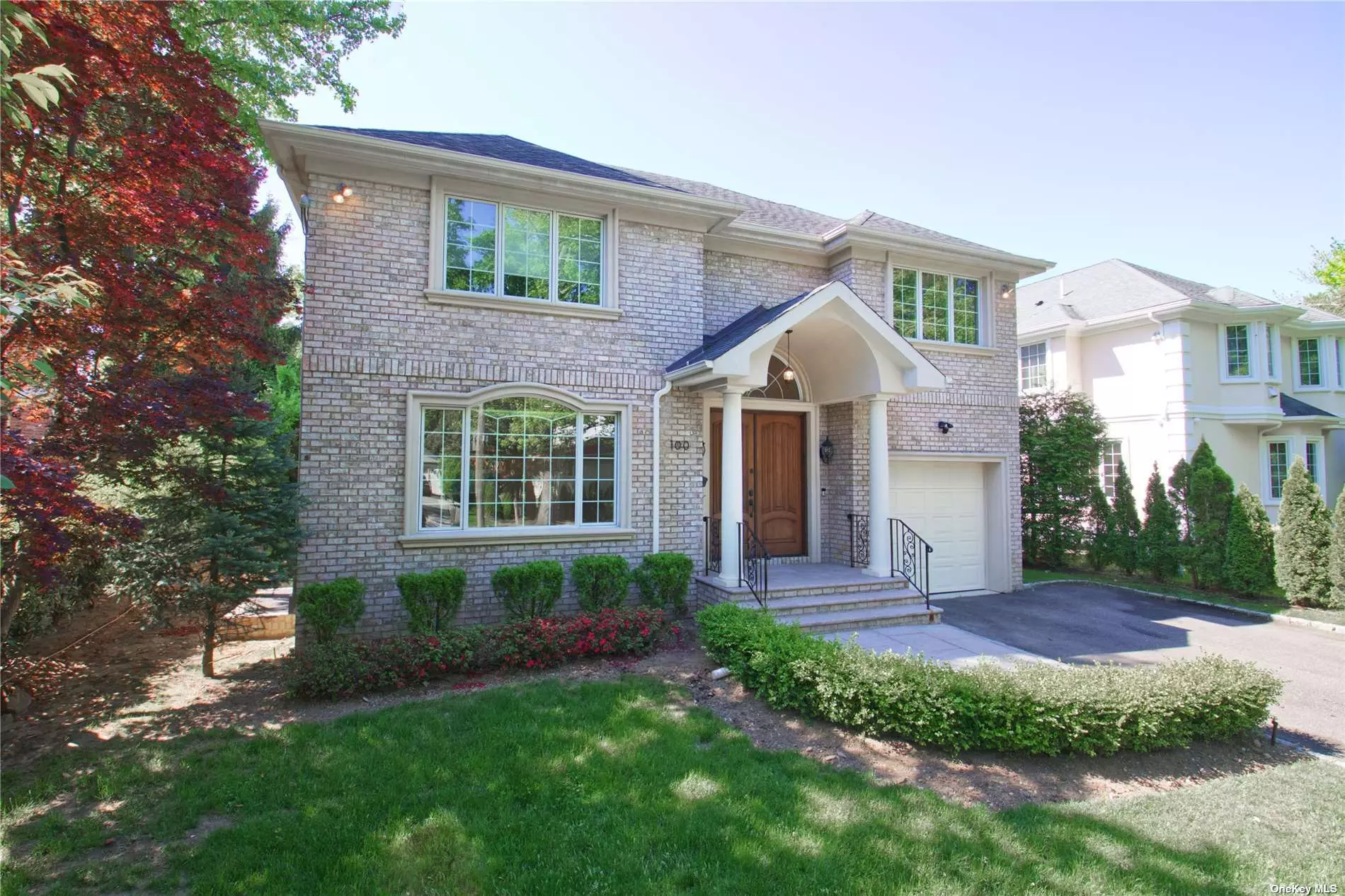 Don&rsquo;t Miss this Great Neck Beauty! Built in 2011, centrally situated in the Village of Great Neck, this thoughtfully laid out 2-story brick Colonial home features 4 bedrooms, 3.5 bathrooms, and a high ceiling basement! The ground floor offers a bright double-high ceiling entry foyer, a formal dining room, a living room, a family room with a fireplace, a powder room, a laundry room, and an open kitchen with top-of-the-line appliances and an oversized island. The second floor boasts a spacious master bedroom with an en-suite bathroom, two walk-in Closets, a large sun deck, additional 3 bedrooms, and a full bathroom. The fully finished basement with 9Ft high ceiling and a full bathroom is a perfect area for entertainment. The attached car garage and chic backyard make the home complete! *** Some photos are virtually staged***