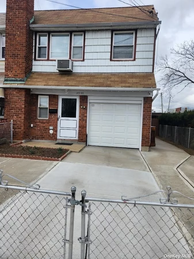 Semi-Detached 2 Family Home, Mint Condition, 3 Over 1 Bedroom, 3 Full Baths, Finished Basement Wih OSE, Attached Garage, New Boiler & New Hot Water Tank.