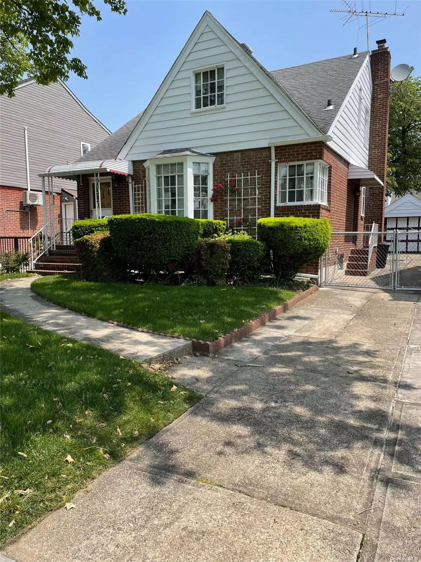 Charming Cape on a lovely tree line street with much curb appeal. Clean house that needs upgrading. Large living room, eat in kitchen , four bedrooms, three full baths finished basement. Ideal mother and daughter with private side entrance. One car detached garage. Great location.         OPEN HOUSE CANCELLED