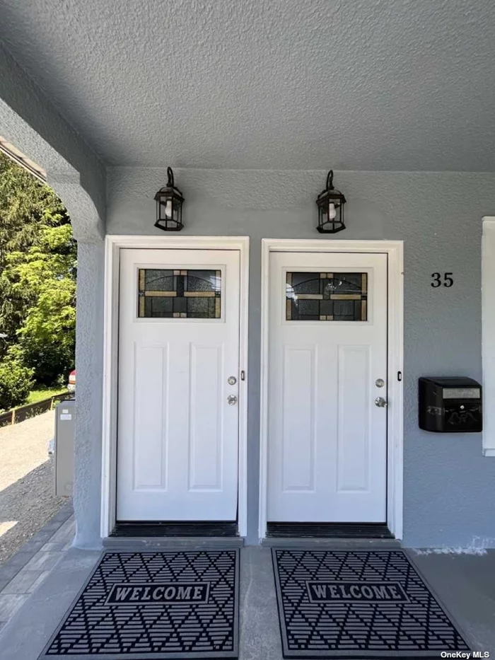 This 2bed/2bath is totally renovated. Finishes will include top of the line vinyl flooring, quartz counter tops, and new shaker cabinets and LED lighting through-out. This unit includes washer dryer in unit with folding station, central air and forced hot air, separate entrance, ample street parking, driveway parking, new outdoor patio/ pavers and it&rsquo;s located on a quiet dead-end street close to both Main St. and the LIRR.