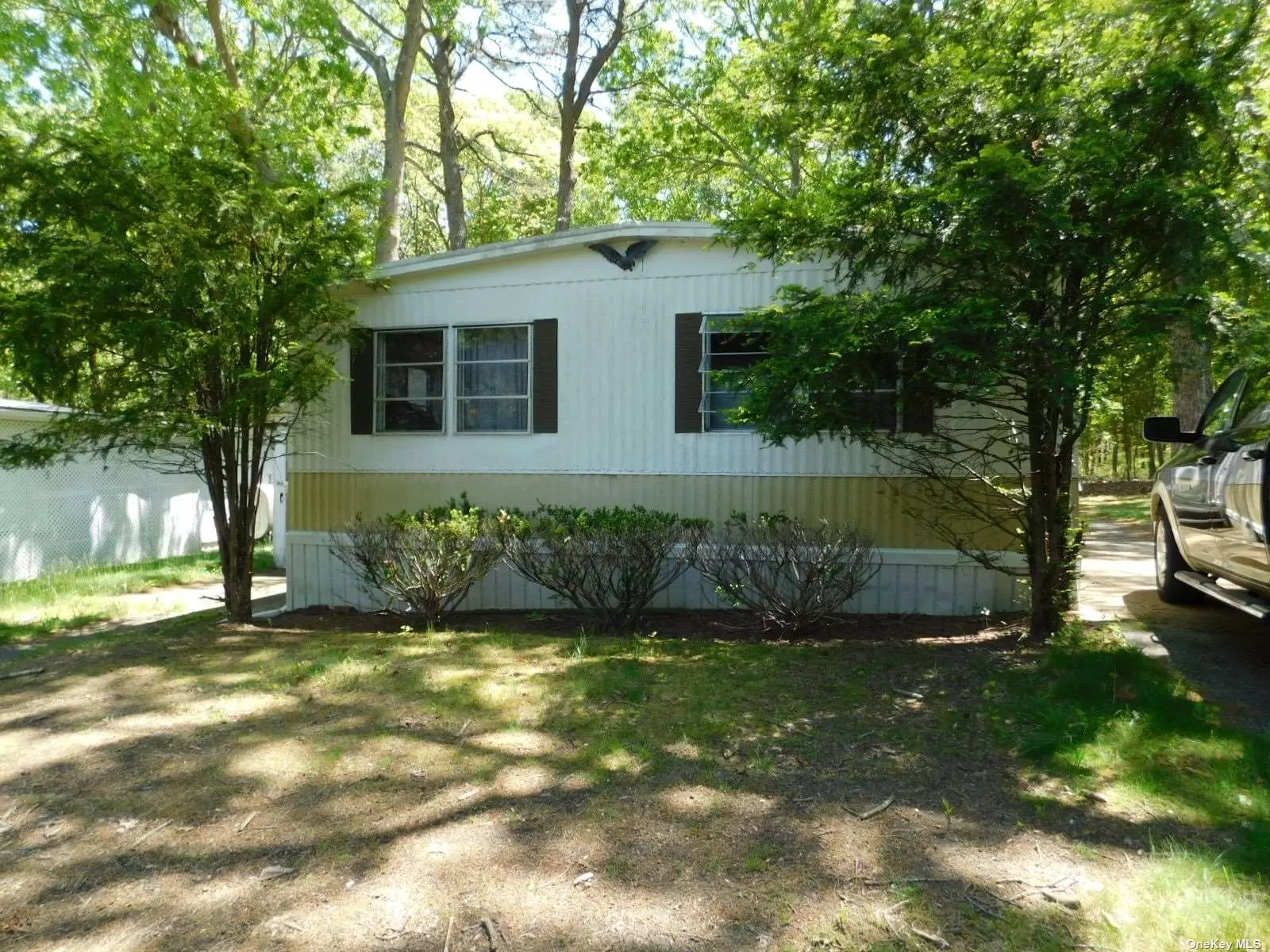 Large 3-bedroom mobile home, 2 baths, backs to woods - private location. Needs total renovation sold all cash as-is only.