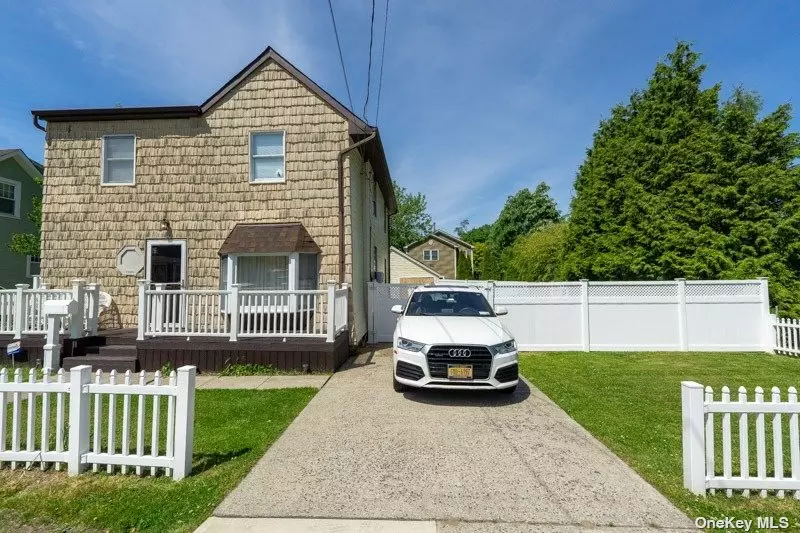 Come make this lovely East Islip home your own. Updated kitchen and baths charming backyard and with flower gardens new decking to enjoy the yard while sitting poolside.