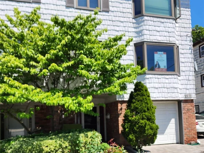 NEW RENTAL: Renovated Semi Detached Triplex House! Offering central AC and Heat all controlled by nest and you can use the app on your phone! Situated close to shopping centers, Fort Totten Parks offering scenic water views, and conveniently located near local highways. Enjoy the proximity to Bayside Marina and the renowned restaurant row on Bell Blvd! Step into a beautifully landscaped front and backyard, featuring custom pavers that enhance the entryway. The dining room seamlessly connects to a deck, providing effortless entertaining options from the kitchen to the backyard. This rental offers 4 bedrooms, including a primary bedroom with a private full bathroom. In total, there are 2.5 bathrooms available. The finished basement features a powder room and a sliding door that opens up to the backyard, allowing everyone to relish the outdoor space. Kindly note that the garage is not included in the rental but the private driveway can fit 2 cars.