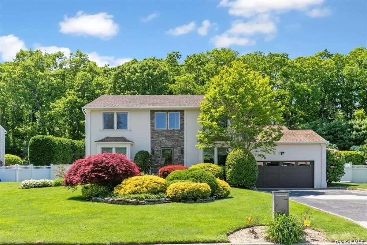 Welcome to your dream home in Dix Hills, situated in the renowned Commack School District. This stunning colonial offers an exquisite blend of modern updates and classic charm. Step inside to discover a beautifully renovated kitchen, boasting state-of-the-art appliances, sleek countertops, and ample storage space. The glistening hardwood floors throughout the main level create an inviting and elegant ambiance. The spacious layout includes a cozy living room, perfect for relaxation or hosting gatherings. The formal dining room provides a stylish setting for formal meals and special occasions. A warm and inviting family room offers a comfortable space for casual lounging or movie nights with loved ones. Retreat to the luxurious master bedroom, featuring ample natural light and a private master bath, creating a tranquil oasis within your own home. With its spacious design and modern amenities, this master suite provides the perfect place to unwind after a long day. Step outside into the backyard paradise, where beautiful stone patios await. Immerse yourself in nature while enjoying a meal prepared in the outdoor kitchen, making outdoor entertaining a breeze. The highlight of the backyard is the sparkling in-ground pool, beckoning you to take a refreshing dip or simply lounge poolside and bask in the sun. The surrounding privacy and serenity provided by the neighboring land that cannot be built on enhance the overall experience. Conveniently located near all the necessary shopping, transportation, and entertainment, this home offers the perfect balance between peaceful seclusion and easy access to amenities. Whether you&rsquo;re in search of retail therapy, dining options, or recreational activities, everything you need is just a short distance away. In summary, this charming colonial in Dix Hills presents a remarkable opportunity to live in a beautifully updated home within the sought-after Commack School District. From the renovated kitchen and hardwood floors to the inviting living spaces and backyard oasis, this residence offers the ideal blend of comfort, luxury, and privacy. Don&rsquo;t miss your chance to make this dream home your own!