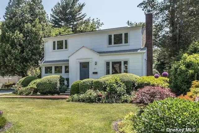 Flawlessly renovated & fully dormered cape located on estate-like property with majestic gardens. All new: kitchen, baths, Marvin windows, driveway lined with Belgian block, & exterior doors. Hardwood floors throughout. Beautiful garden views from mid block location on quiet street. Move right in!