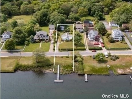 Waterfront homeownership is within reach! Welcome to the deep waters of Senix Creek. This cozy 2 bedroom home has the charm of yesteryear with endless water views and your own private dock. A premier street in bustling Center Moriches, Lake Avenue is a true boater&rsquo;s delight. This home&rsquo;s ideal location, close to the open bay, enhances the home&rsquo;s serene natural and nautical environment & appeal. The property consists of two parcels, separated by Lake Avenue itself, totaling .59 acres. It&rsquo;s fixed & floating dock was built in 2009. Generations have enjoyed this cozy home and peaceful area,  now ready for those who are open to renovation or building anew. Inviting rear yard is the perfect place to create your own destination place.