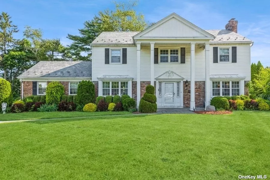 Classic Center Hall Colonial located on a 169 x 135 Beauiful Landscaped Corner Lot. This Fabulous Munsey Park Home Features 5 Large Bedrooms; 3.5 Baths, Formal Living Room w/Fplc; Elegant Dining Room; Sun-Filled Family Room; Spacious Eat-in-Kitchen; Mud Room/Laundry. Full Basement. 2-Car Garage. A Must See! Sold-As-Is. Munsey Park Elementary.